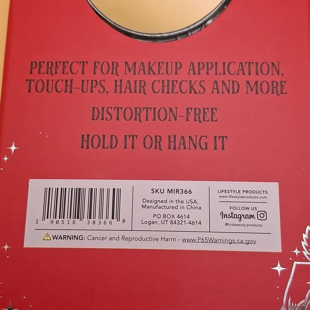Skull magnifying handheld mirror